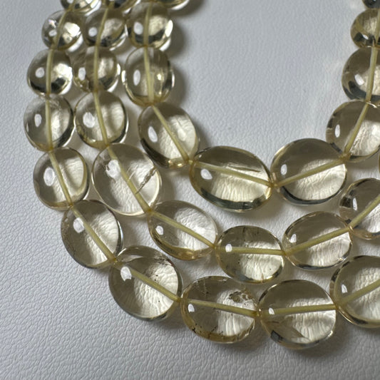 宝石質 スキャポライト スムースオーバル カラーレスニュアンスイエロー 1連