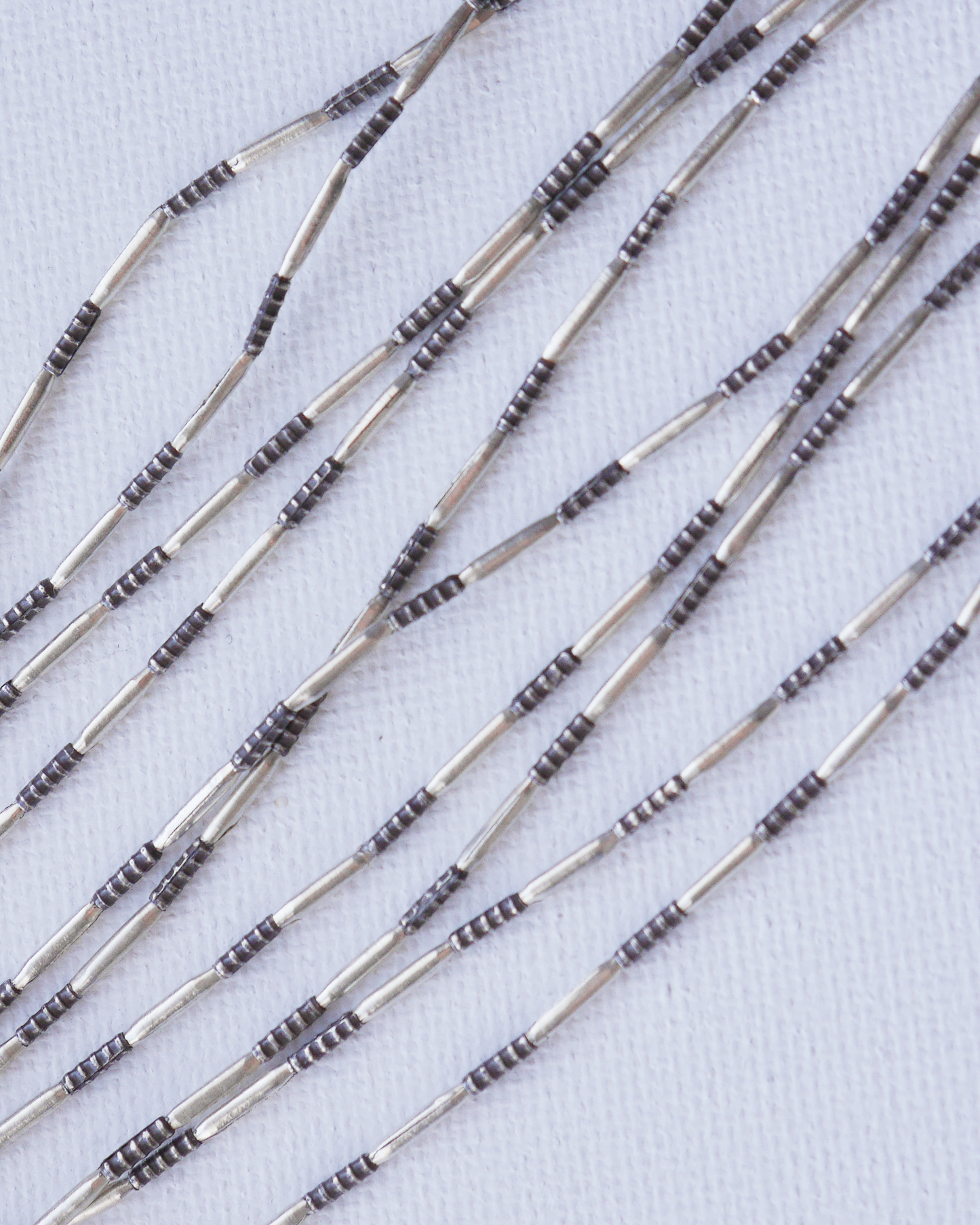 KSB143	カレンシルバー ビーズ テクスチャーチューブBlack 1連