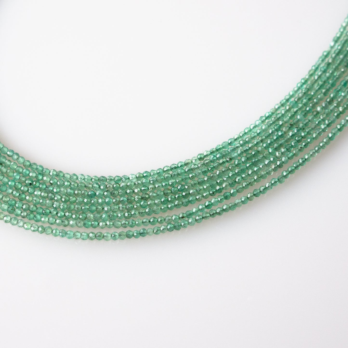 Emerald Faceted Semi-Round Beads 1Strand