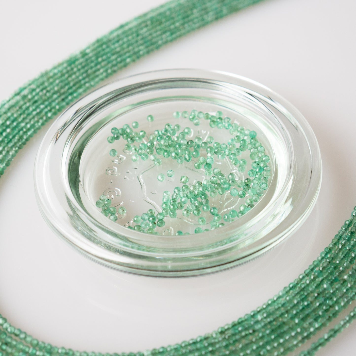 Emerald Faceted Semi-Round Beads 1Strand
