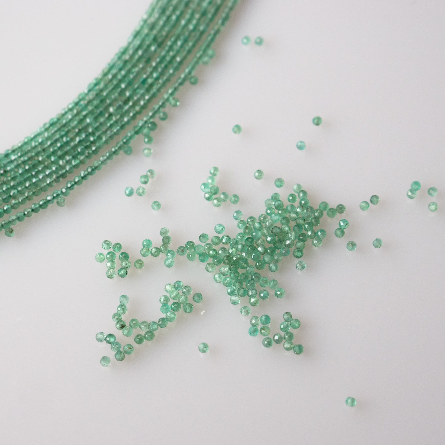 Emerald Faceted Semi-Round Beads 1Strand