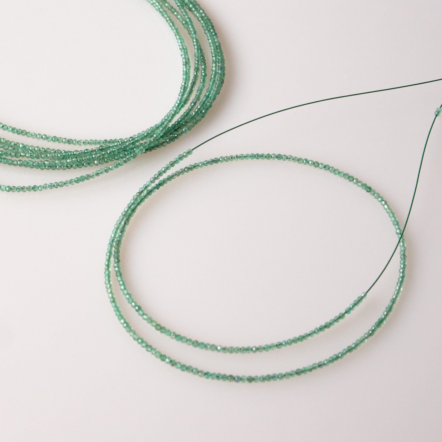 Emerald Faceted Semi-Round Beads 1Strand
